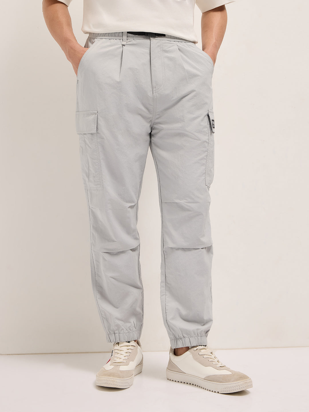 grey nylon relaxed fit cargo pants with utility pockets grey nylon relaxed fit cargo pants with utility pockets