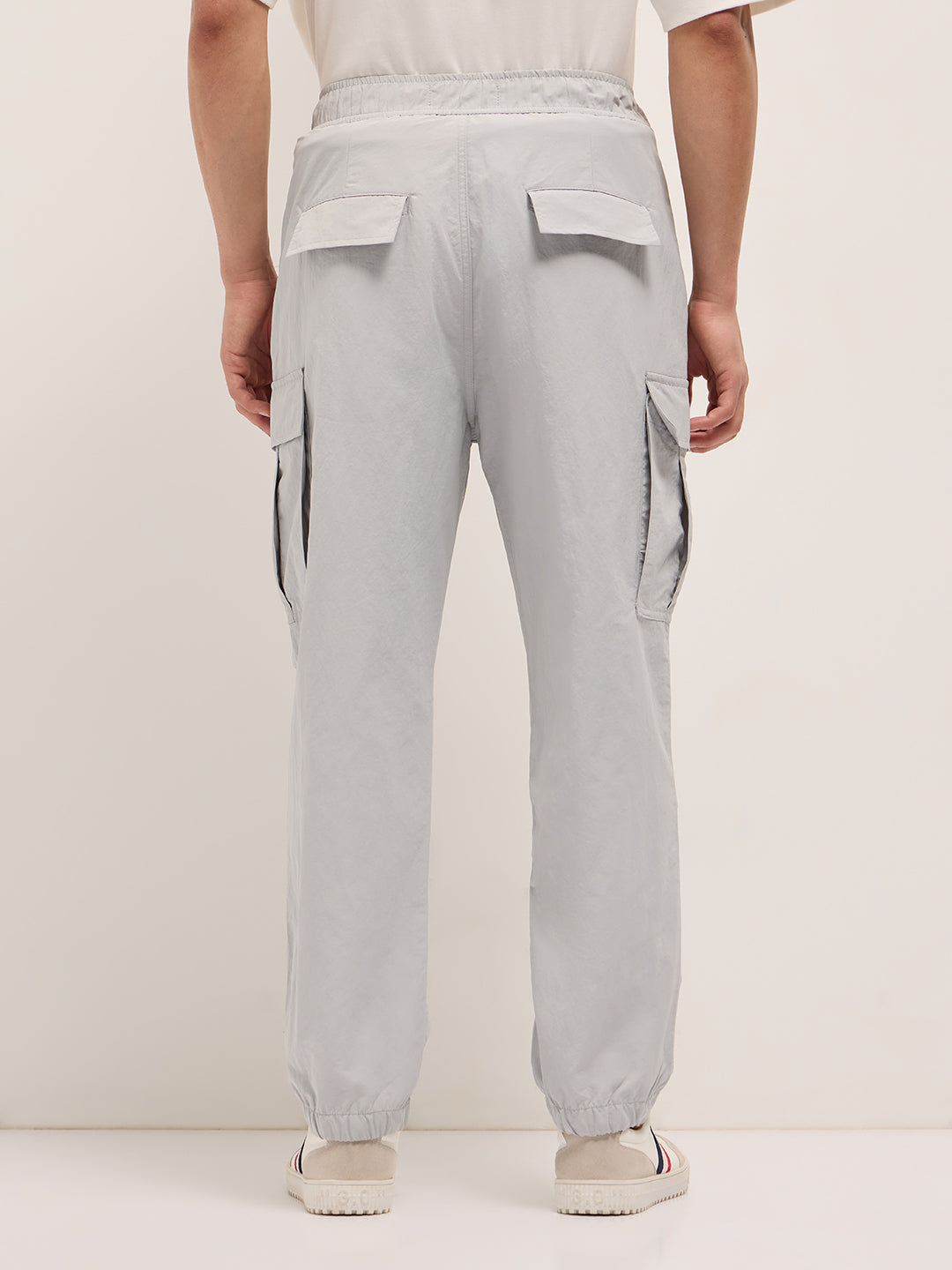 grey nylon relaxed fit cargo pants with utility pockets grey nylon relaxed fit cargo pants with utility pockets