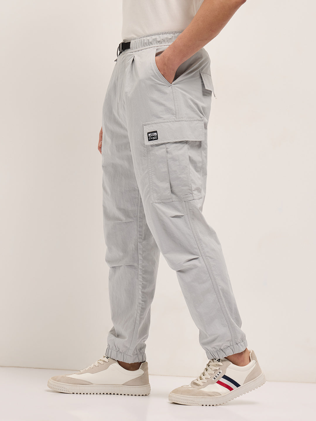 grey nylon relaxed fit cargo pants with utility pockets grey nylon relaxed fit cargo pants with utility pockets