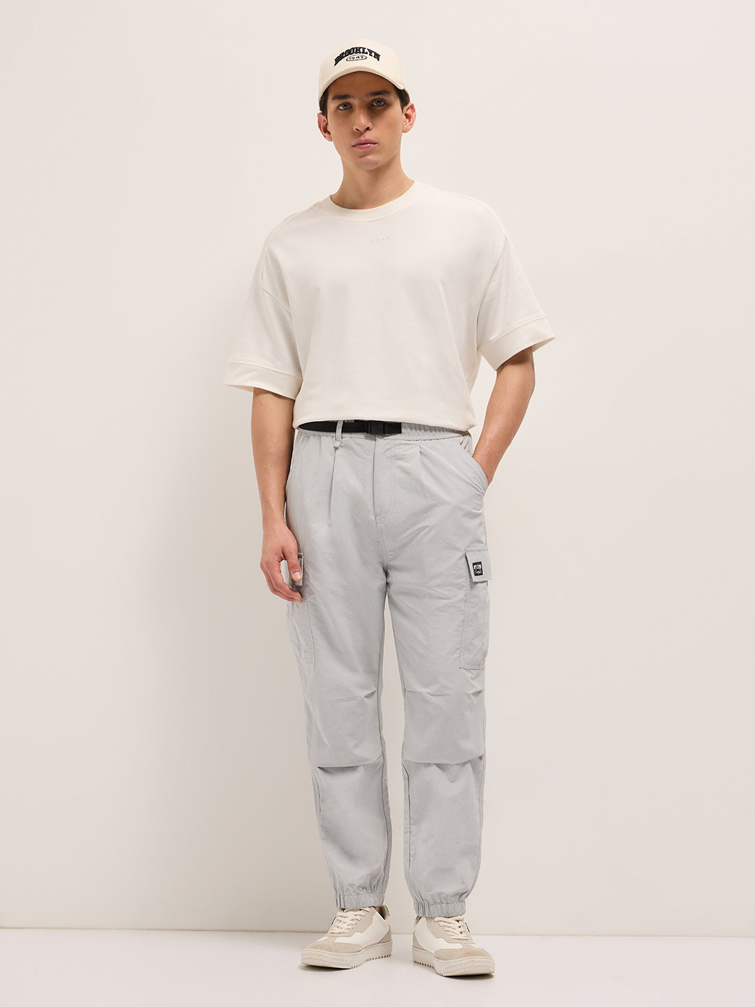 grey nylon relaxed fit cargo pants with utility pockets grey nylon relaxed fit cargo pants with utility pockets