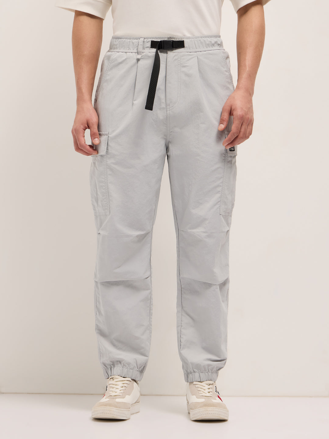 grey nylon relaxed fit cargo pants with utility pockets grey nylon relaxed fit cargo pants with utility pockets
