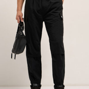 black nylon relaxed fit cargo pants with utility pockets