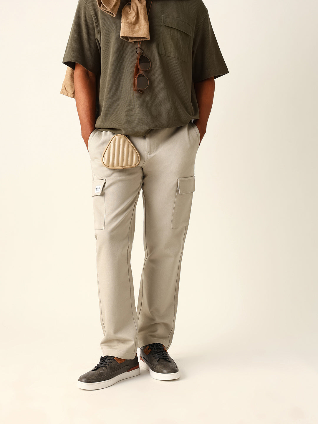 beige solid straight fit cargo trousers with flap pockets beige solid straight fit cargo trousers with flap pockets