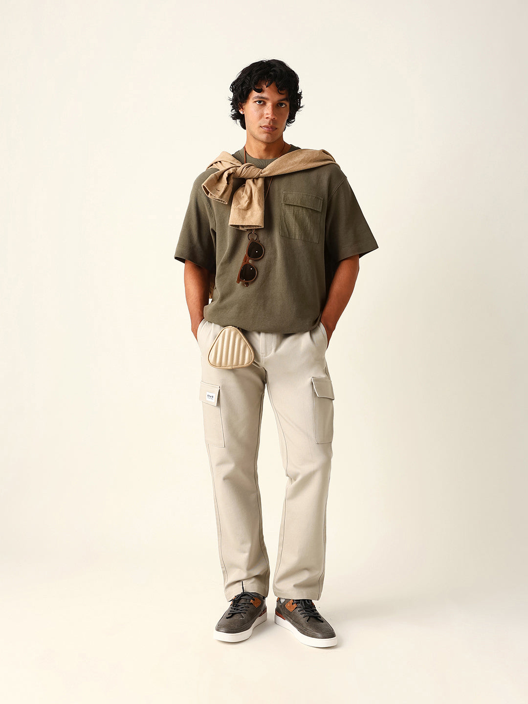 beige solid straight fit cargo trousers with flap pockets beige solid straight fit cargo trousers with flap pockets