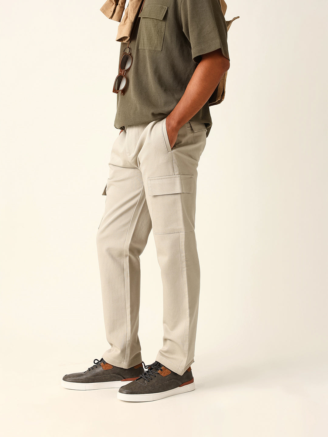 beige solid straight fit cargo trousers with flap pockets beige solid straight fit cargo trousers with flap pockets