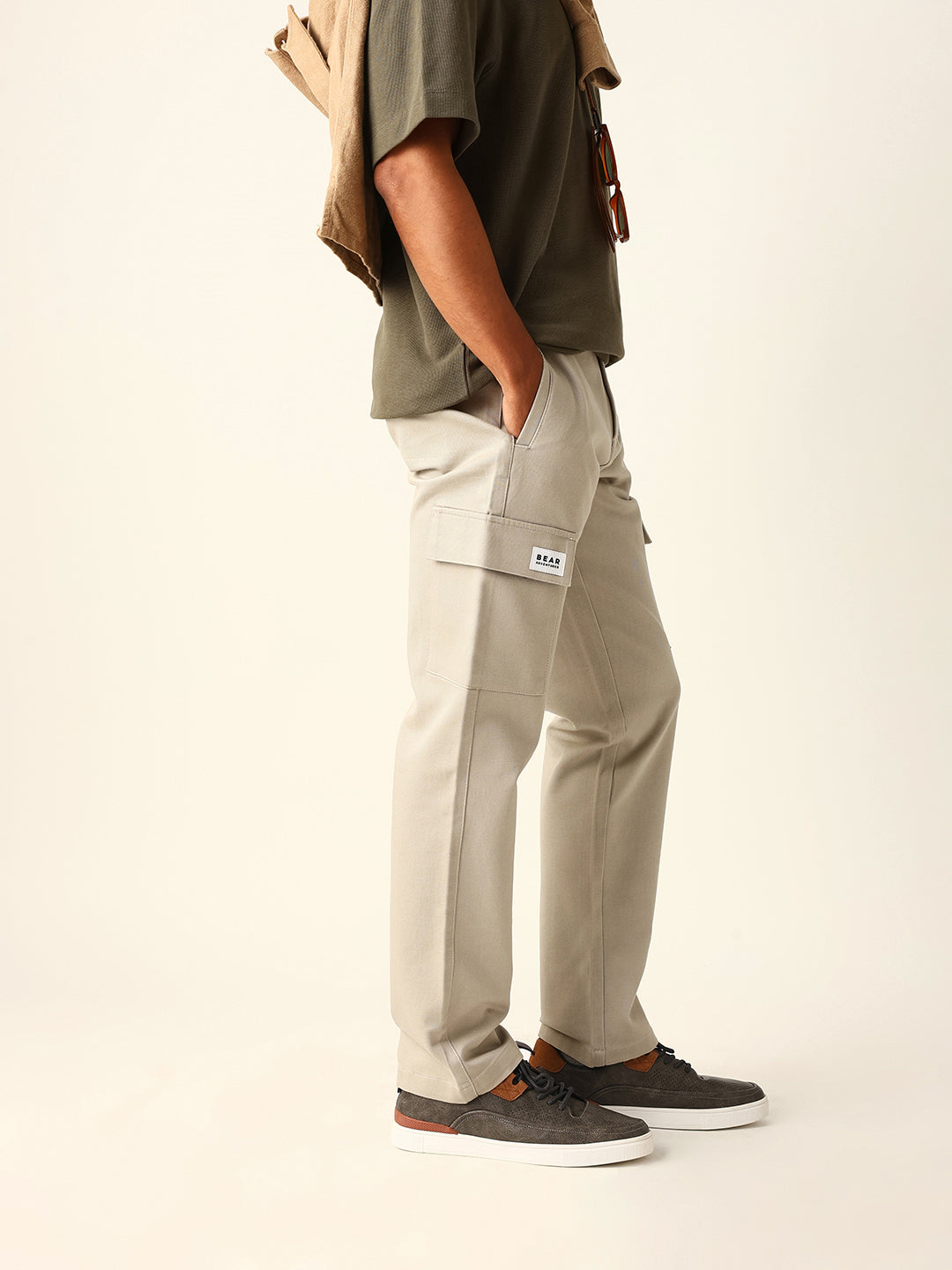 beige solid straight fit cargo trousers with flap pockets beige solid straight fit cargo trousers with flap pockets