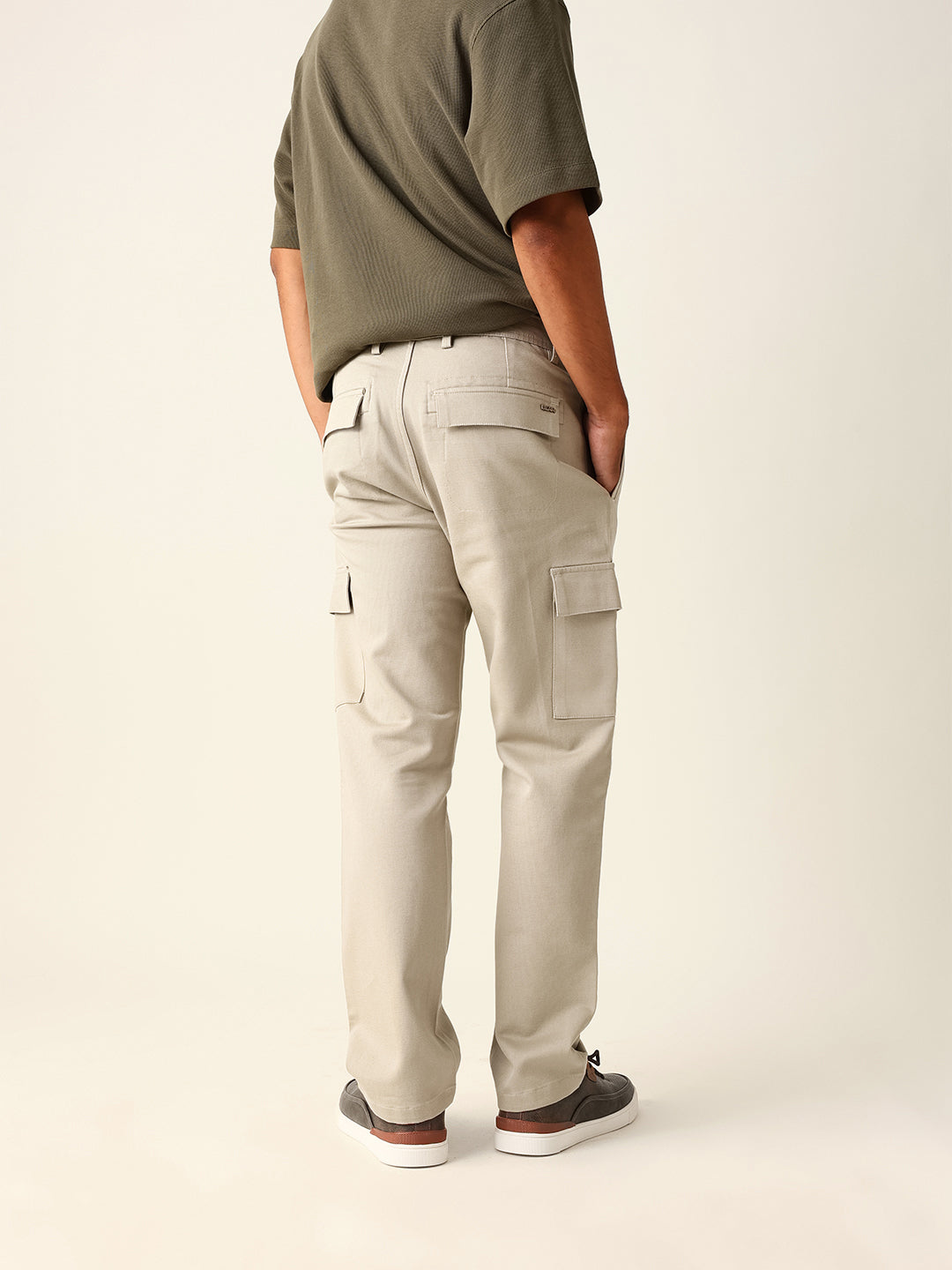 beige solid straight fit cargo trousers with flap pockets beige solid straight fit cargo trousers with flap pockets