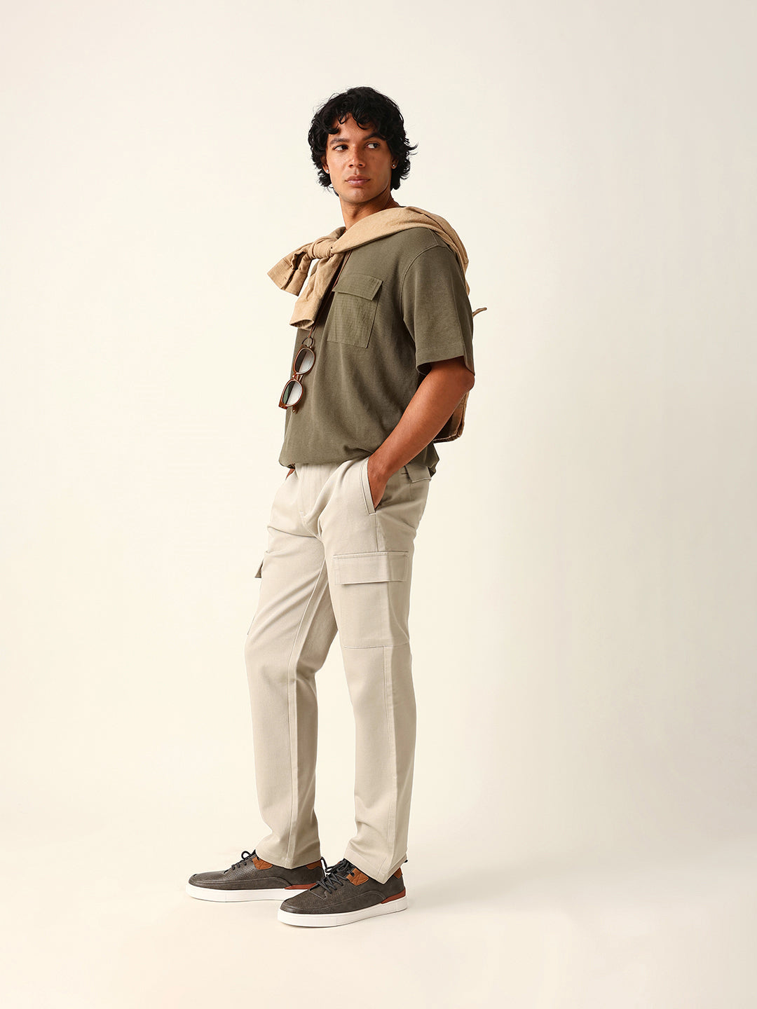 beige solid straight fit cargo trousers with flap pockets beige solid straight fit cargo trousers with flap pockets