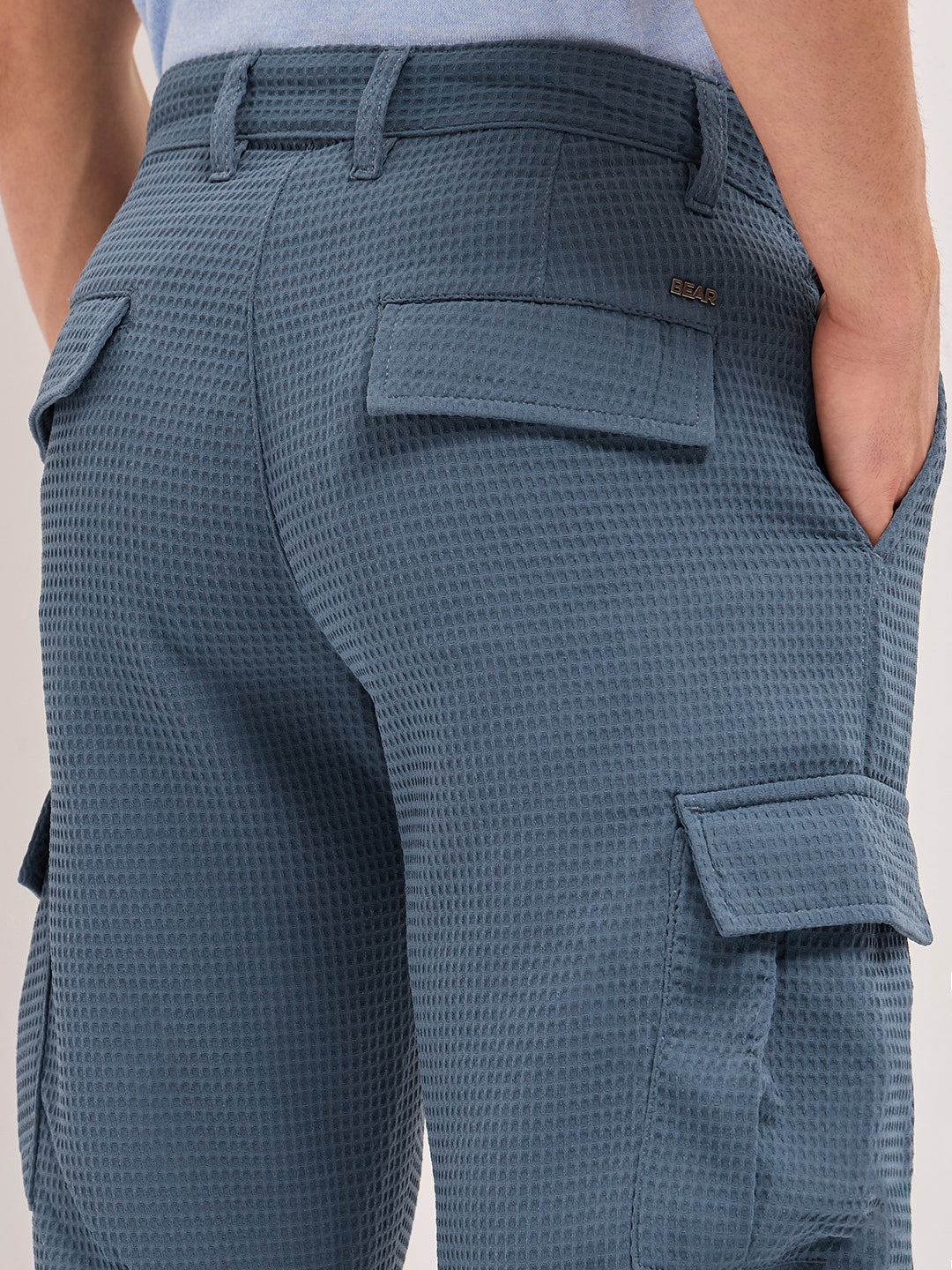 blue textured waffle weave straight fit cargo pants with flap pockets blue textured waffle weave straight fit cargo pants with flap pockets
