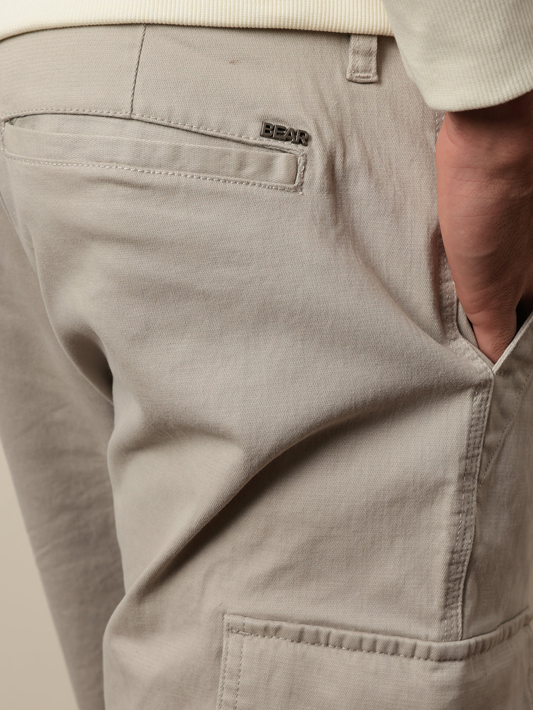 light grey solid relaxed fit cargo trousers with utility pockets light grey solid relaxed fit cargo trousers with utility pockets