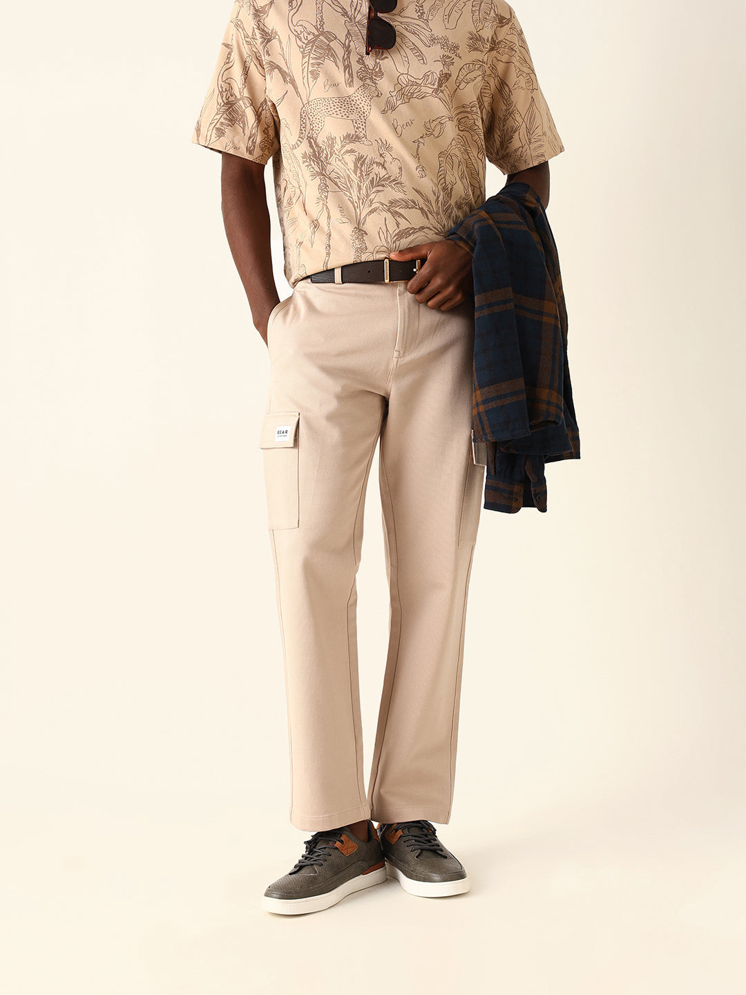 cream solid straight fit cargo trousers with flap pockets cream solid straight fit cargo trousers with flap pockets