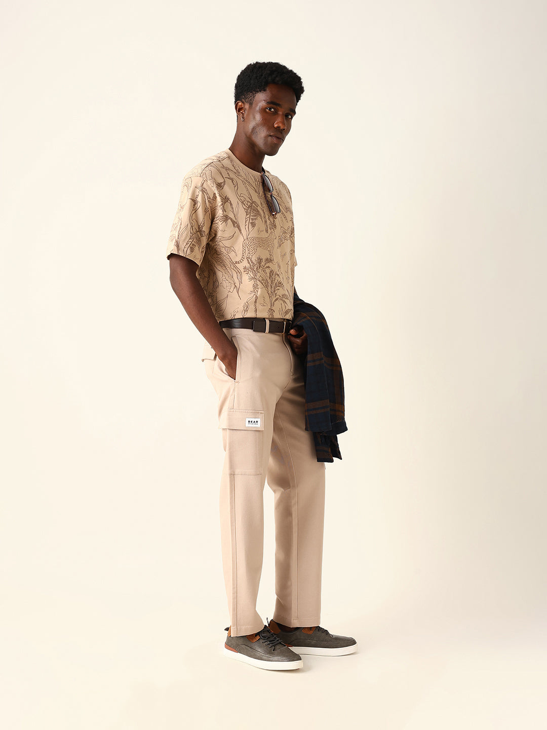 cream solid straight fit cargo trousers with flap pockets cream solid straight fit cargo trousers with flap pockets