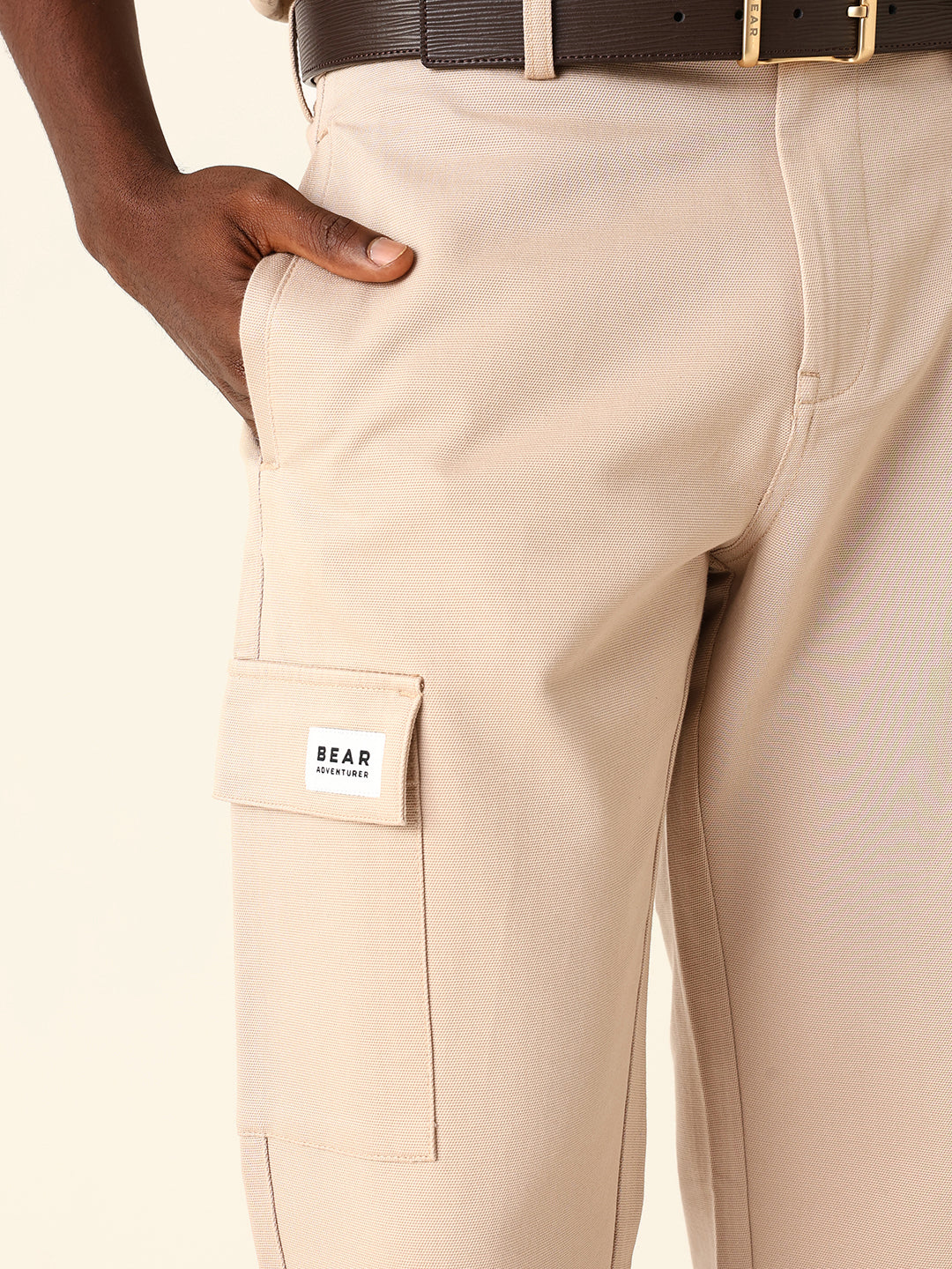 cream solid straight fit cargo trousers with flap pockets cream solid straight fit cargo trousers with flap pockets