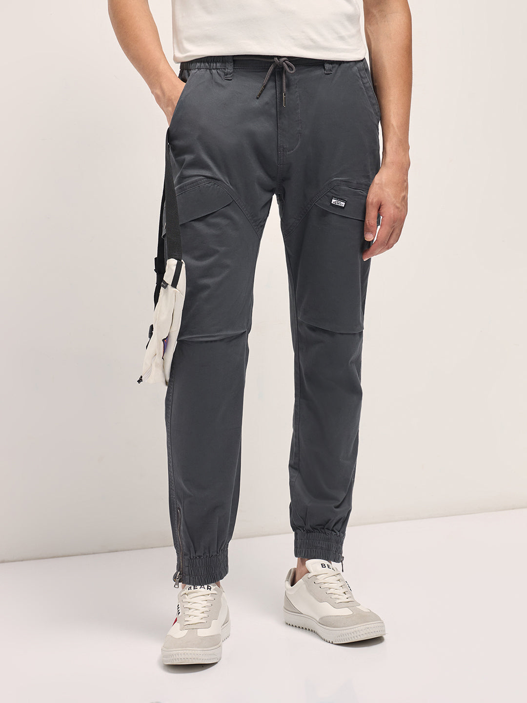 grey cotton relaxed fit cargo pants with elastic waist and utility pockets grey cotton relaxed fit cargo pants with elastic waist and utility pockets