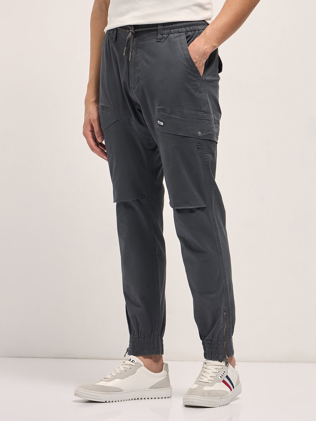 grey cotton relaxed fit cargo pants with elastic waist and utility pockets grey cotton relaxed fit cargo pants with elastic waist and utility pockets