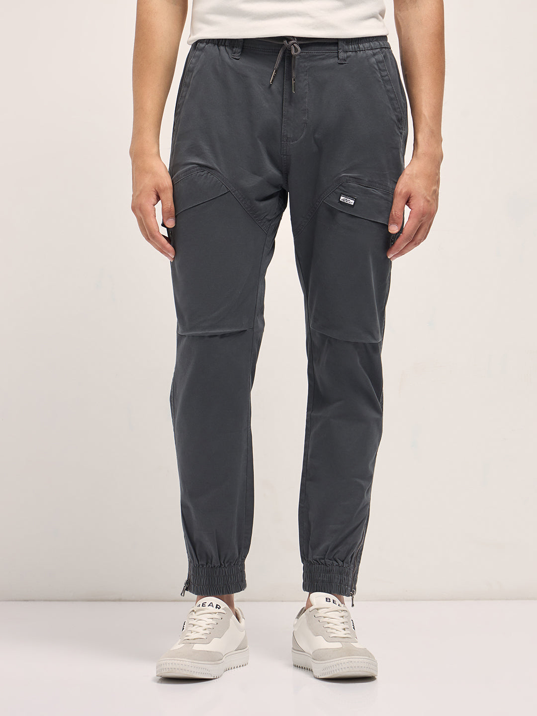 grey cotton relaxed fit cargo pants with elastic waist and utility pockets grey cotton relaxed fit cargo pants with elastic waist and utility pockets
