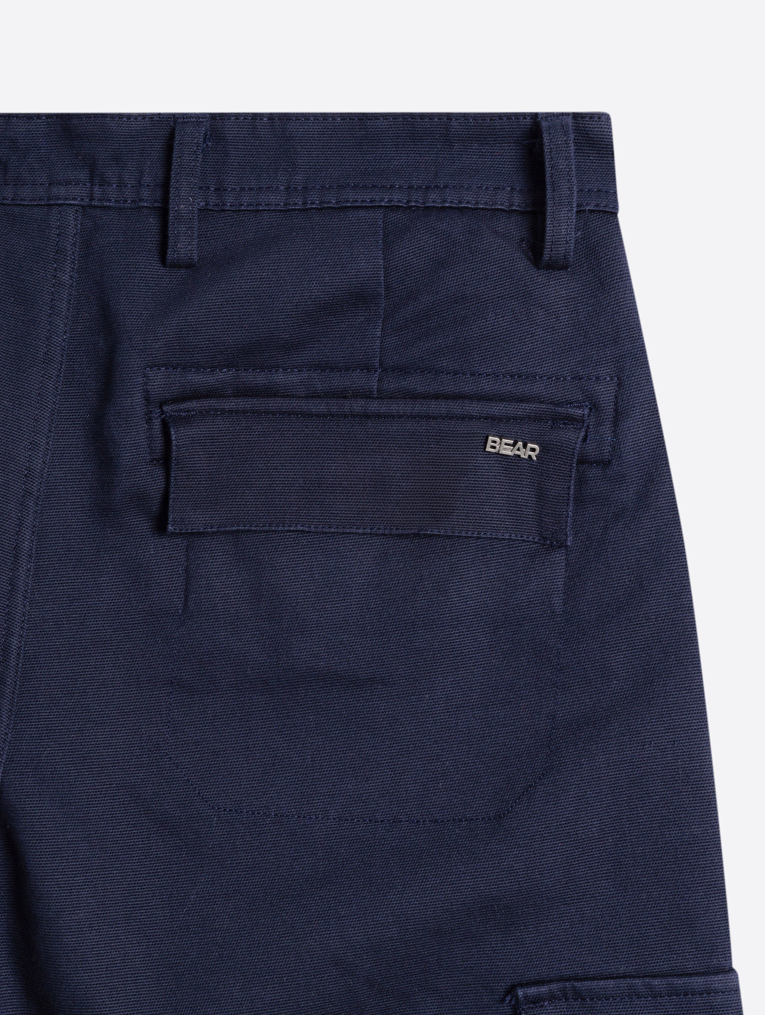navy solid straight fit cargo trousers with flap pockets navy solid straight fit cargo trousers with flap pockets