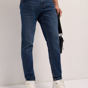 mid blue mid rise slim fit jeans with light fade