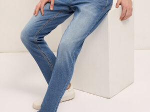 mid blue mid rise slim fit jeans with mid fade
