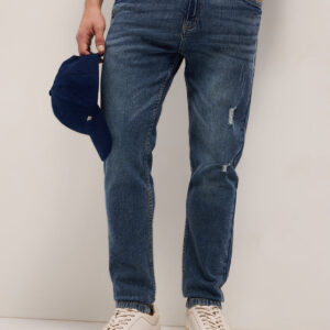 mid blue mid rise slim fit jeans with lightly distressed