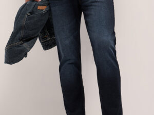 dark blue mid rise slim fit jeans with light fade