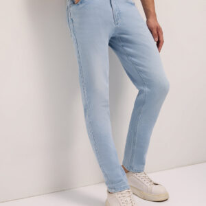 light blue mid rise slim fit jeans with mid fade