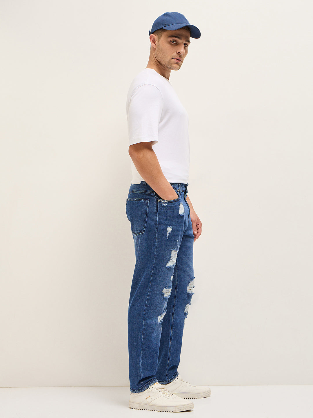 blue with light fade high distressed mid rise relaxed fit jeans blue with light fade high distressed mid rise relaxed fit jeans