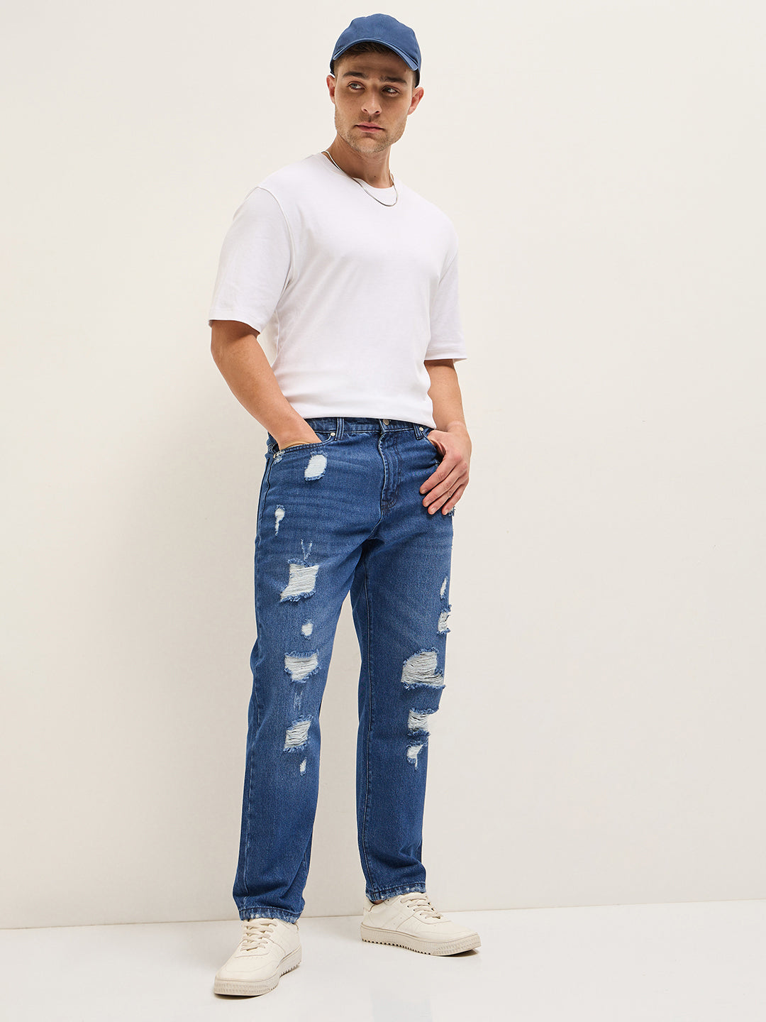blue with light fade high distressed mid rise relaxed fit jeans blue with light fade high distressed mid rise relaxed fit jeans