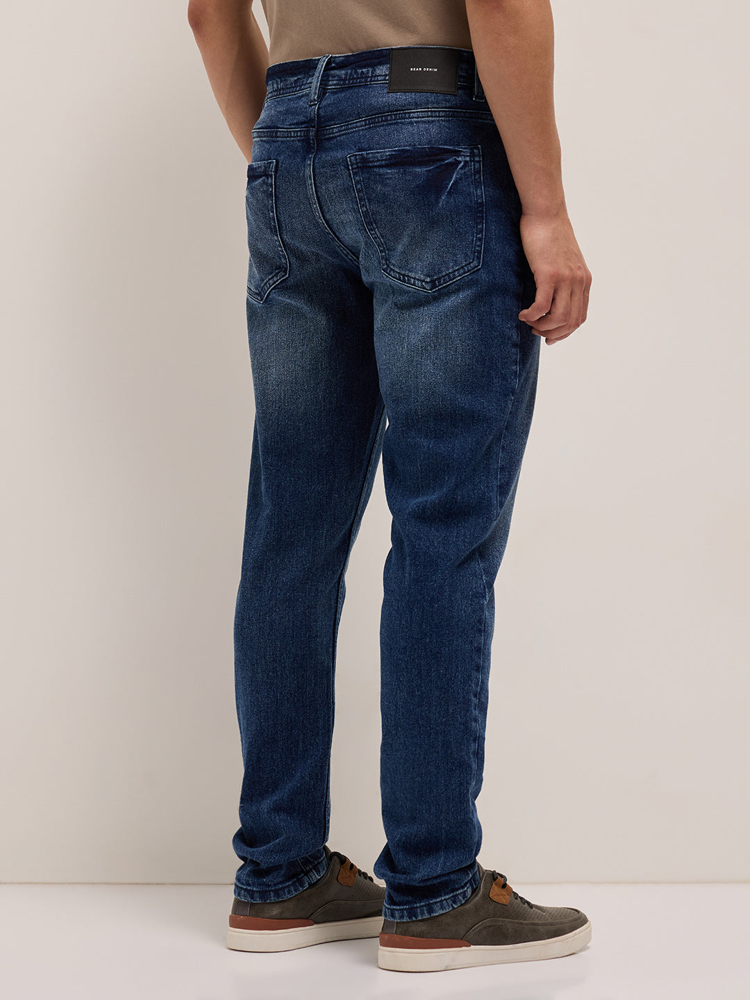 mid blue mid rise slim fit jeans with light fade mid blue mid rise slim fit jeans with light fade