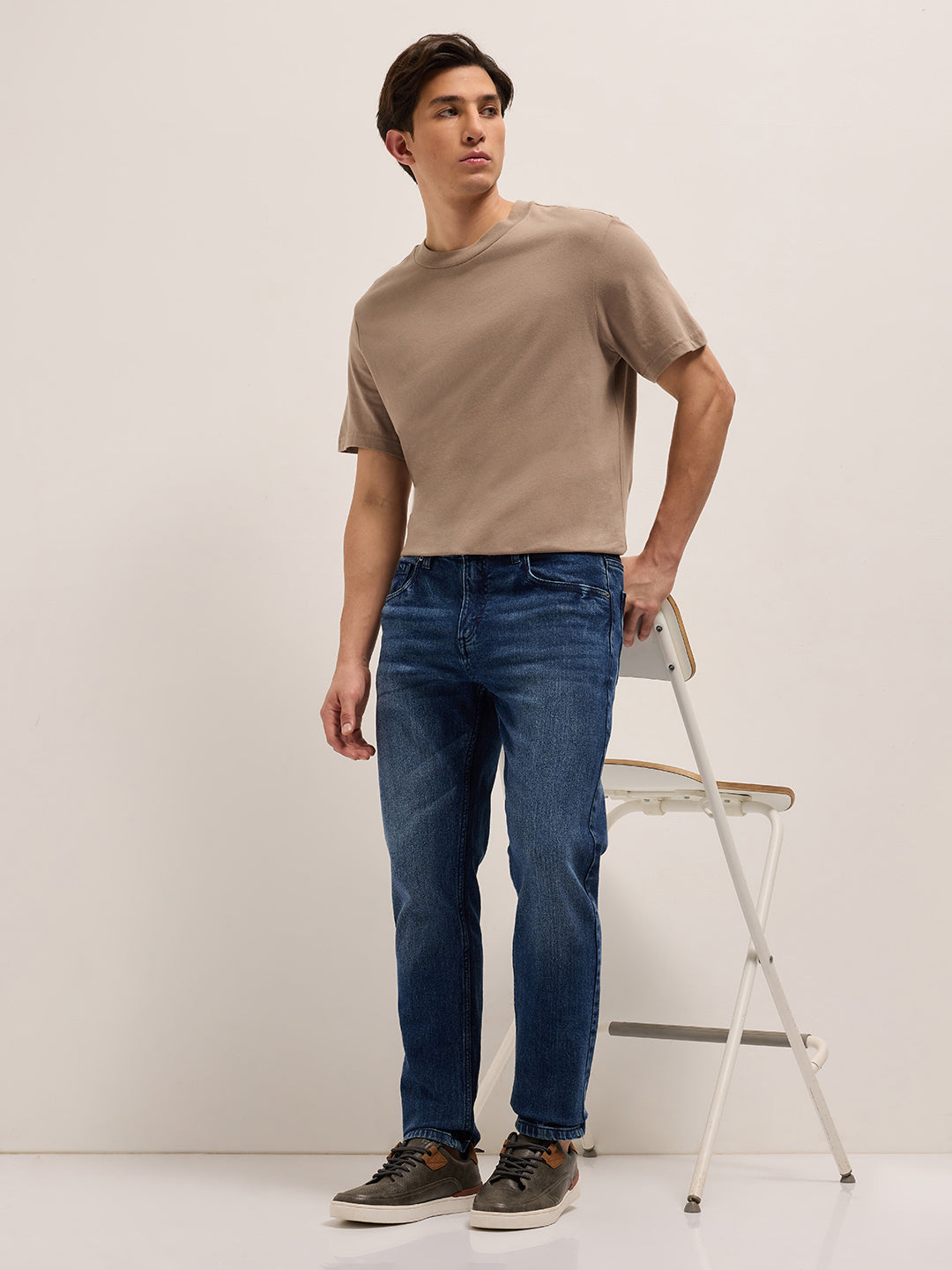 mid blue mid rise slim fit jeans with light fade mid blue mid rise slim fit jeans with light fade