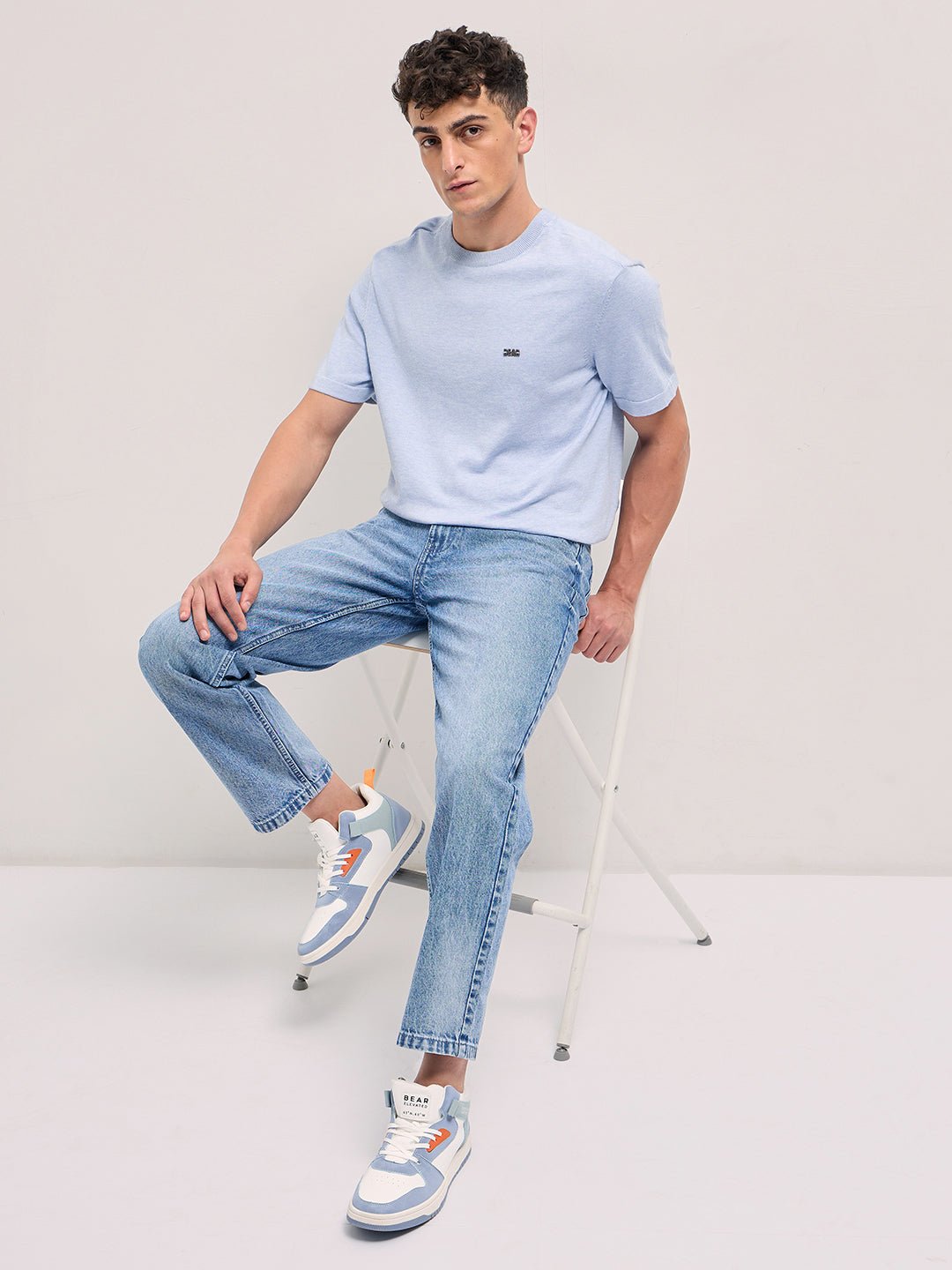 mid blue straight fit mid rise jean with light washed effect mid blue straight fit mid rise jean with light washed effect