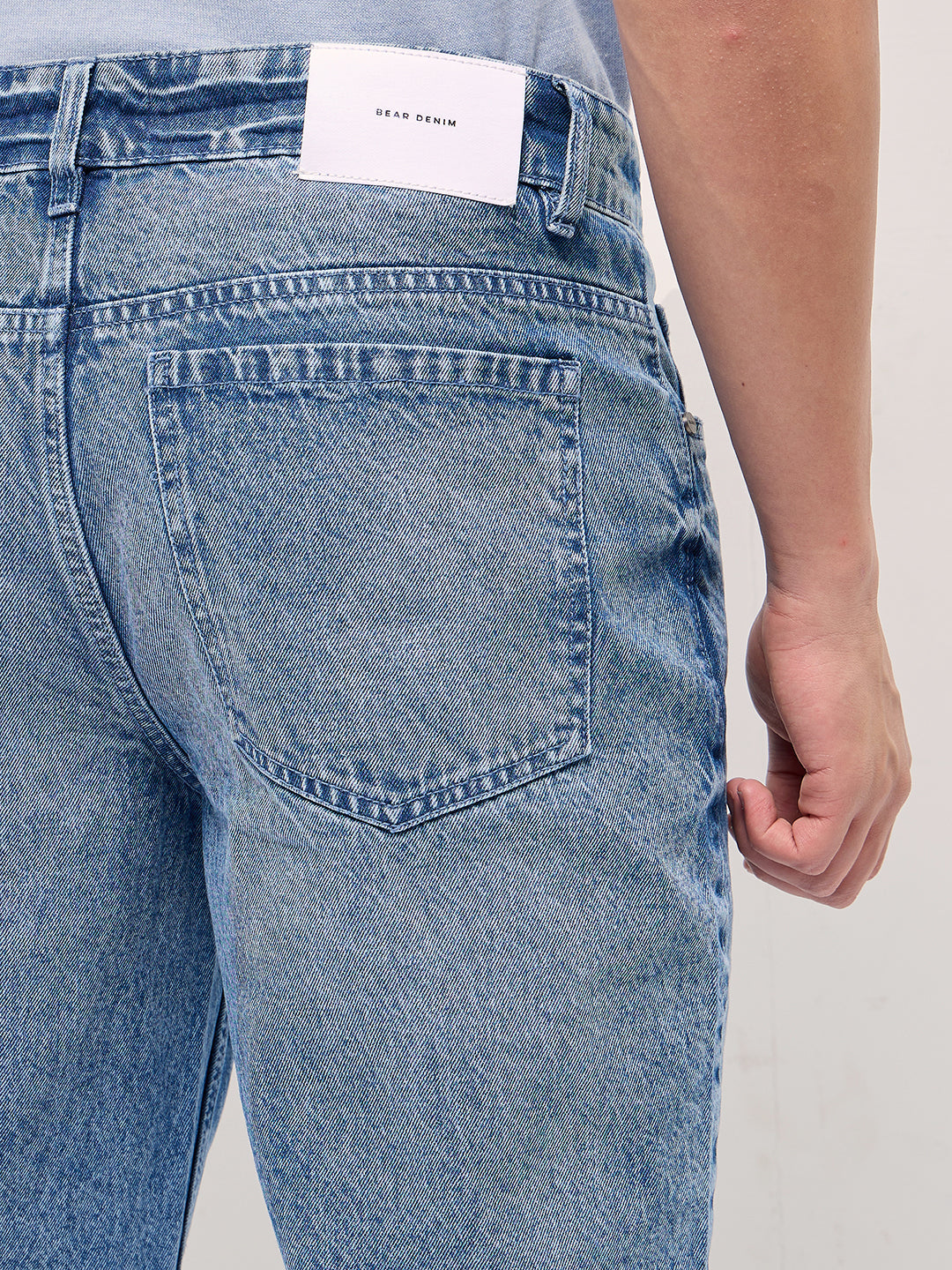 mid blue straight fit mid rise jean with light washed effect mid blue straight fit mid rise jean with light washed effect
