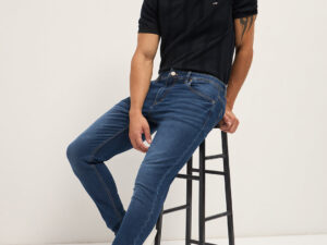 dark blue mid rise skinny fit jeans with mid fade