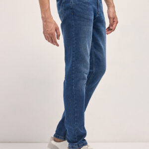 mid blue mid rise slim fit jeans with mid fade