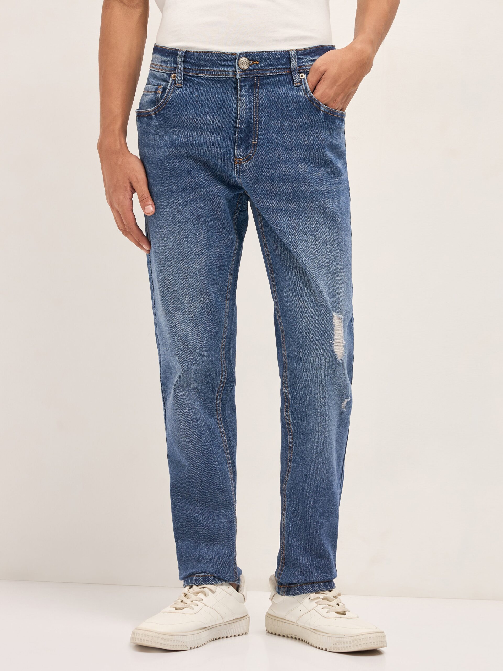 mid blue mid rise slim fit jeans with lightly distressed mid blue mid rise slim fit jeans with lightly distressed
