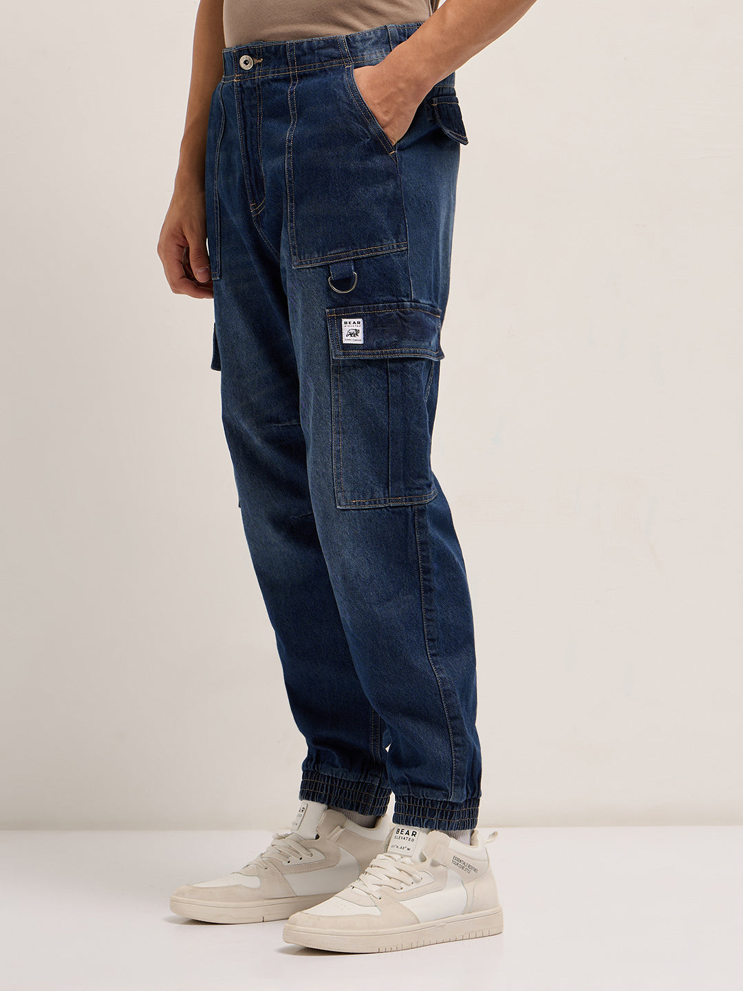 dark blue baggy fit jogger style jean with cargo pockets dark blue baggy fit jogger style jean with cargo pockets