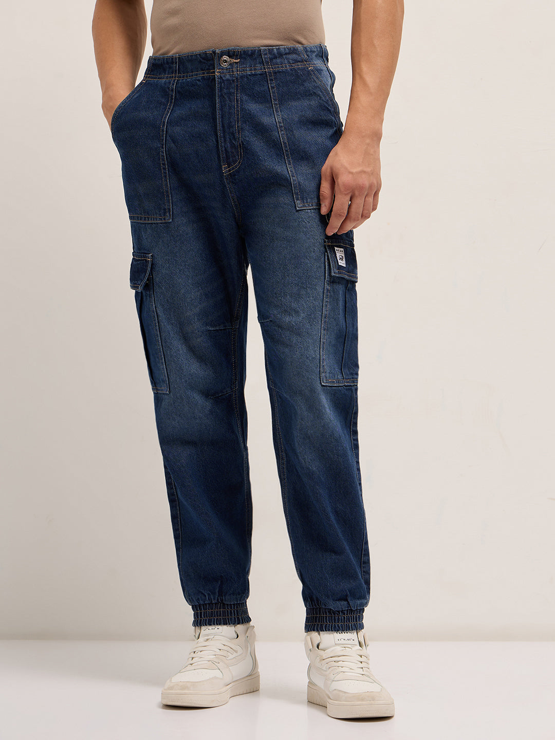 dark blue baggy fit jogger style jean with cargo pockets dark blue baggy fit jogger style jean with cargo pockets