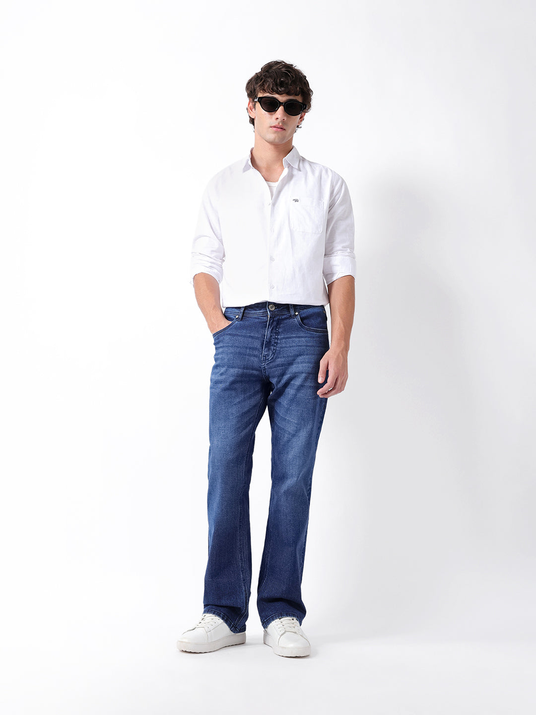 mid blue mid rise bootcut jeans with mid fade mid blue mid rise bootcut jeans with mid fade