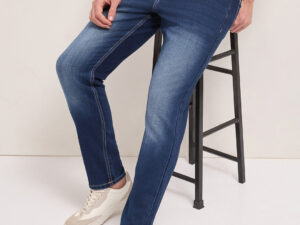 blue mid rise slim fit jeans with mid fade