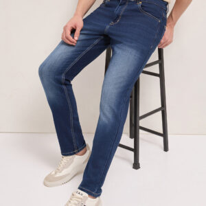 blue mid rise slim fit jeans with mid fade