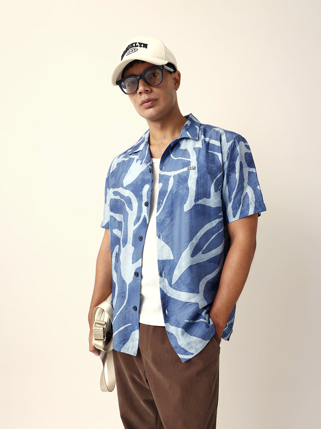 blue abstract free flowing stroke printed relaxed fit short sleeve shirt blue abstract free flowing stroke printed relaxed fit short sleeve shirt