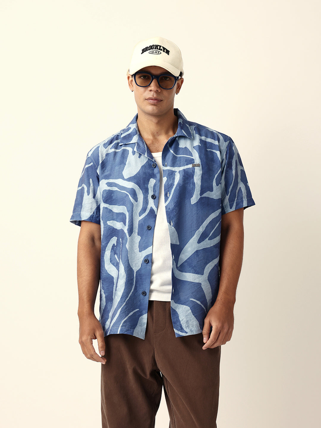 blue abstract free flowing stroke printed relaxed fit short sleeve shirt blue abstract free flowing stroke printed relaxed fit short sleeve shirt