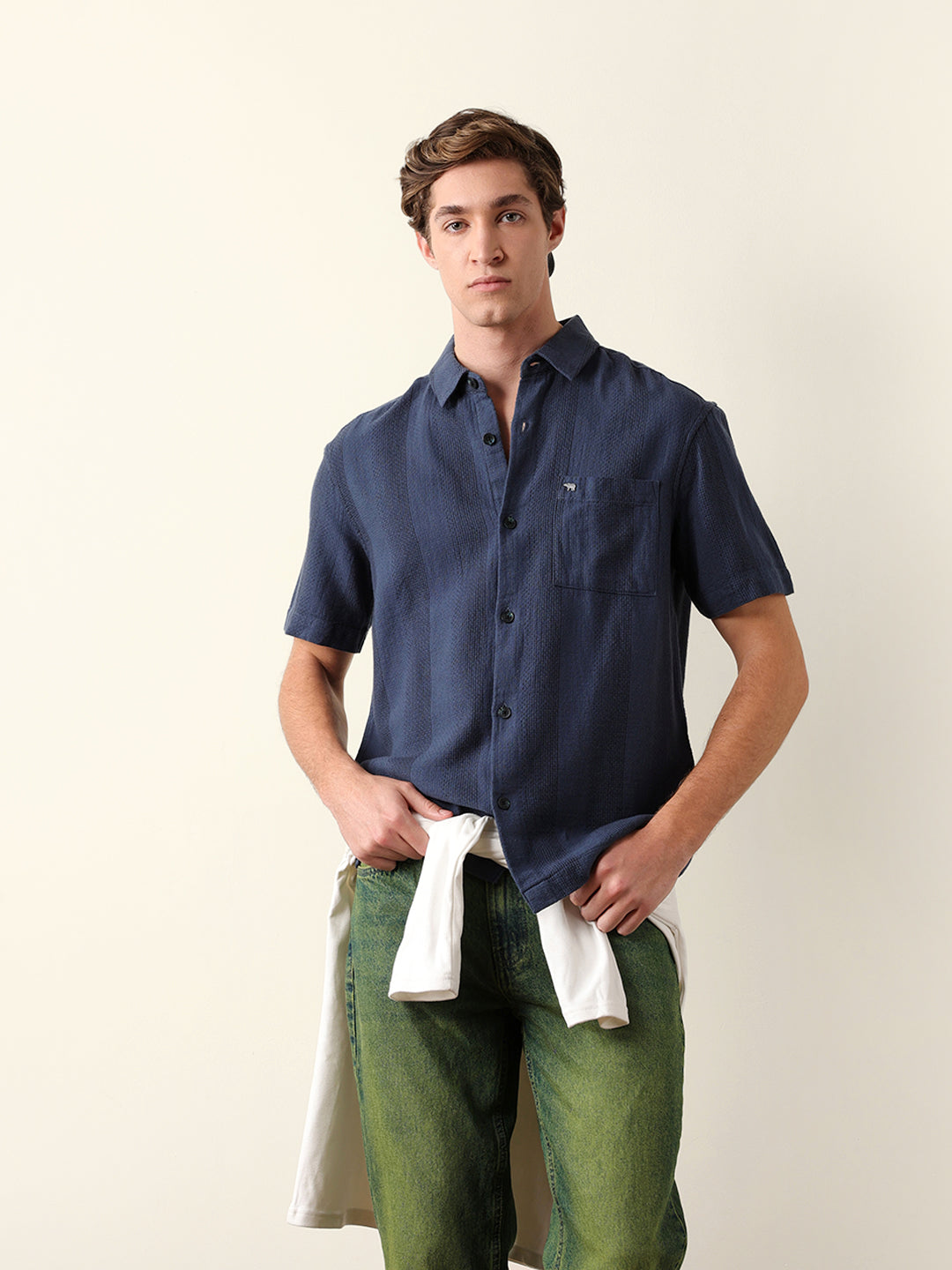 blue relaxed fit casual half sleeve shirt with textured vertical stripes blue relaxed fit casual half sleeve shirt with textured vertical stripes
