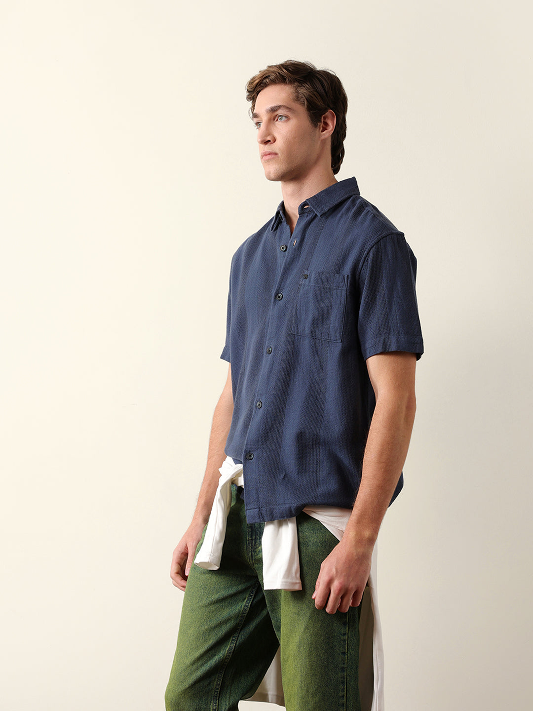 blue relaxed fit casual half sleeve shirt with textured vertical stripes blue relaxed fit casual half sleeve shirt with textured vertical stripes