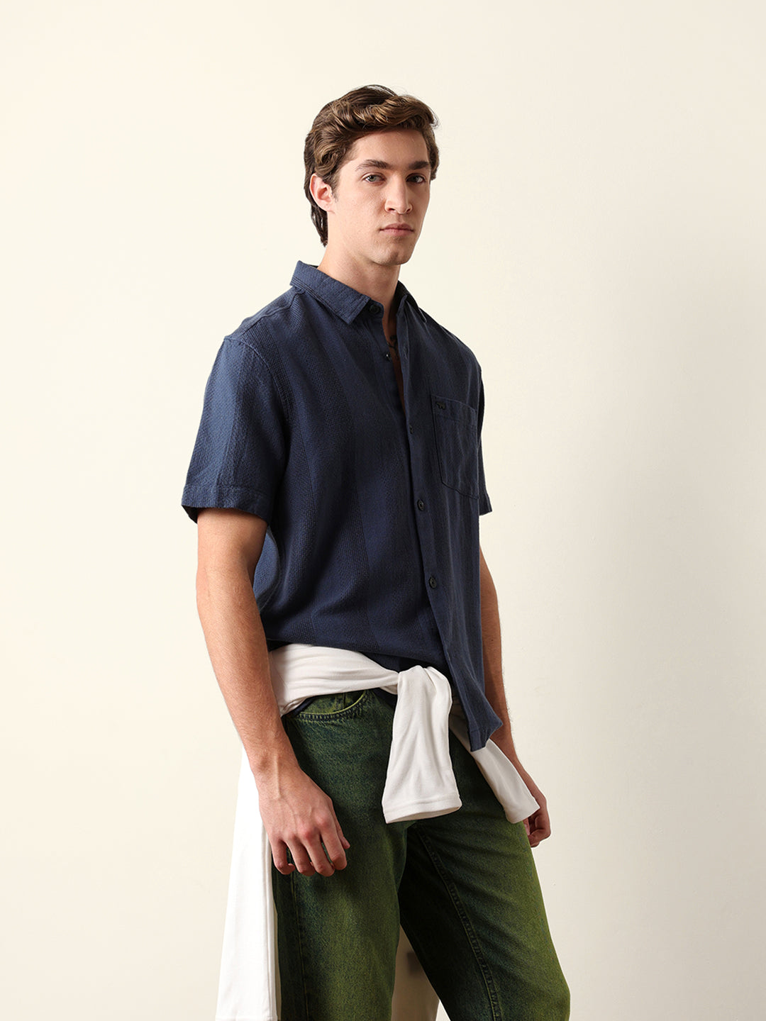 blue relaxed fit casual half sleeve shirt with textured vertical stripes blue relaxed fit casual half sleeve shirt with textured vertical stripes