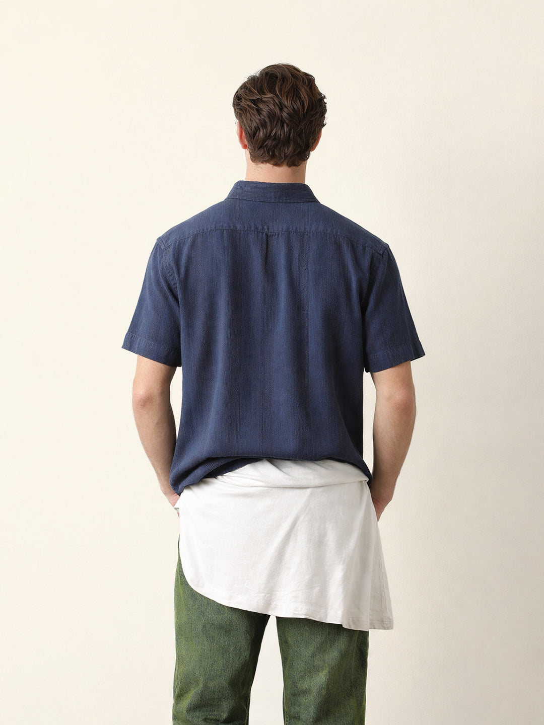blue relaxed fit casual half sleeve shirt with textured vertical stripes blue relaxed fit casual half sleeve shirt with textured vertical stripes