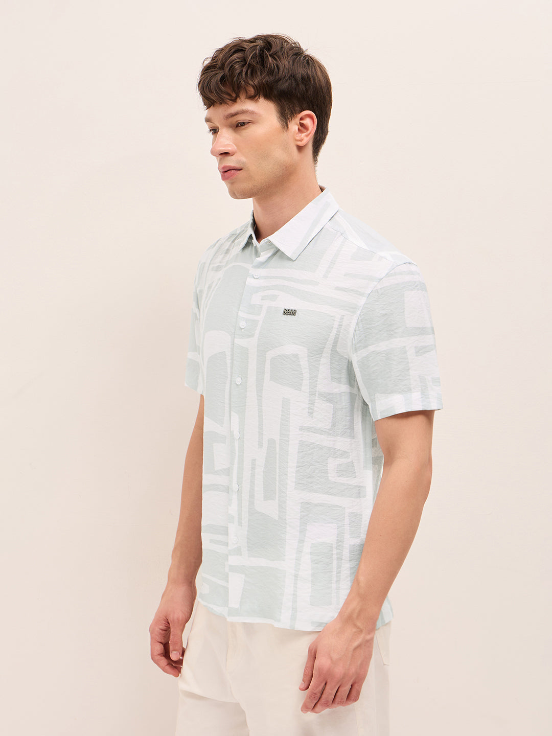 white & blue relaxed fit abstract stroke print half sleeve casual shirt white & blue relaxed fit abstract stroke print half sleeve casual shirt