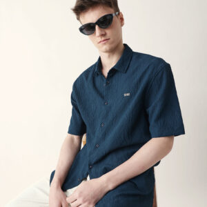 dark teal all over textured leaf motif oversized shirt with half sleeves