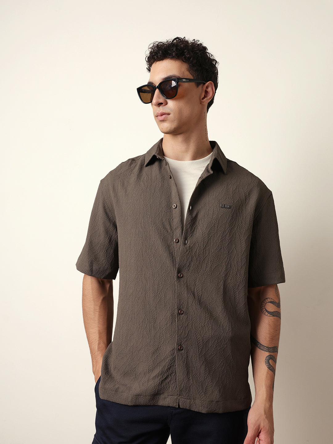 olive all over textured leaf motif oversized shirt with half sleeves olive all over textured leaf motif oversized shirt with half sleeves