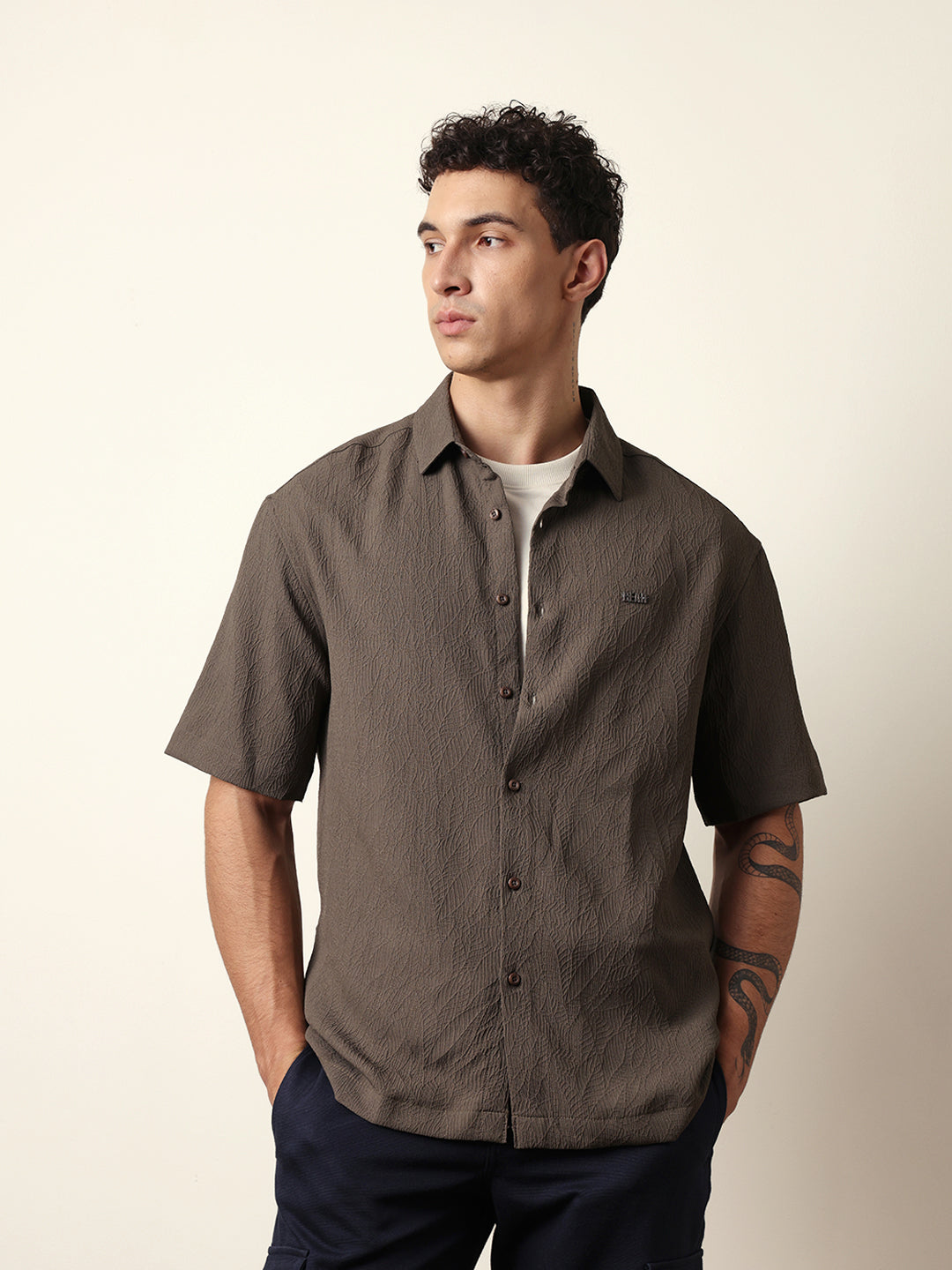 olive all over textured leaf motif oversized shirt with half sleeves olive all over textured leaf motif oversized shirt with half sleeves